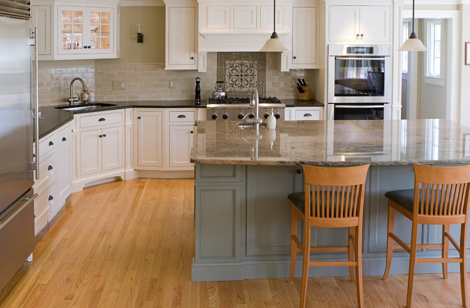 Repainted cabinets and kitchen island in a kitchen in Lomabrd, Illinois