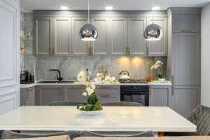 Grey and white painted kitchen cabinets in Kildeer, Illinois