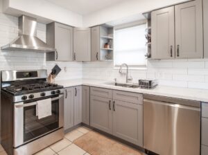 Painted gray kitchen cabinets at a house in Naperville, Illinois